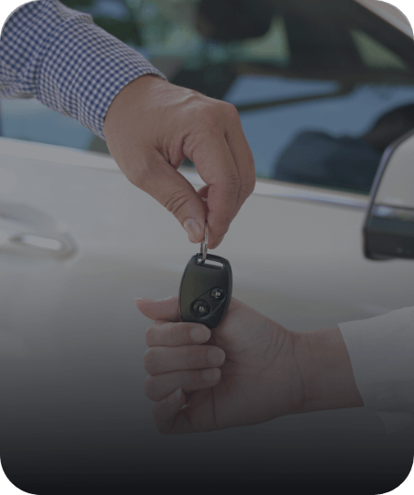 releasing car keys to a new vehicle owner